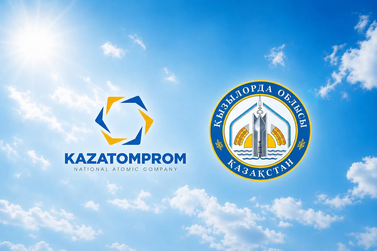 Kazatomprom and Kyzylorda region emblems against the sky